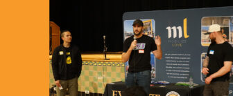 Ryan Thompson speaks into a microphone